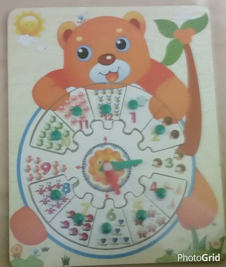 mainan puzzle jam edukatif